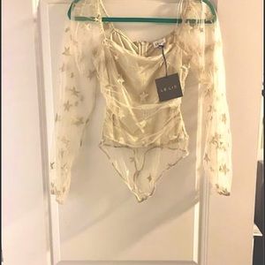 CUTESY BODY SUIT EVER. PERFECT FOR GIRLS NIGHT